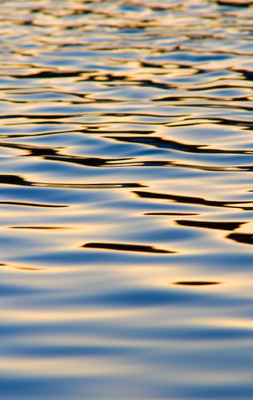 Sunrise on Water - Early morning sunlight reflected in a light breeze